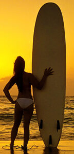 Illustration of surf girl at sunset on the beach